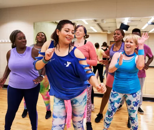 women in group fitness class